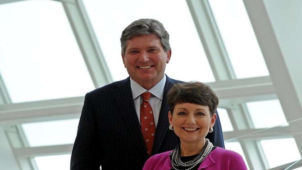 Piedmont Natural Gas chairman and CEO Thomas Skains and Duke Energy CEO Lynn Good.