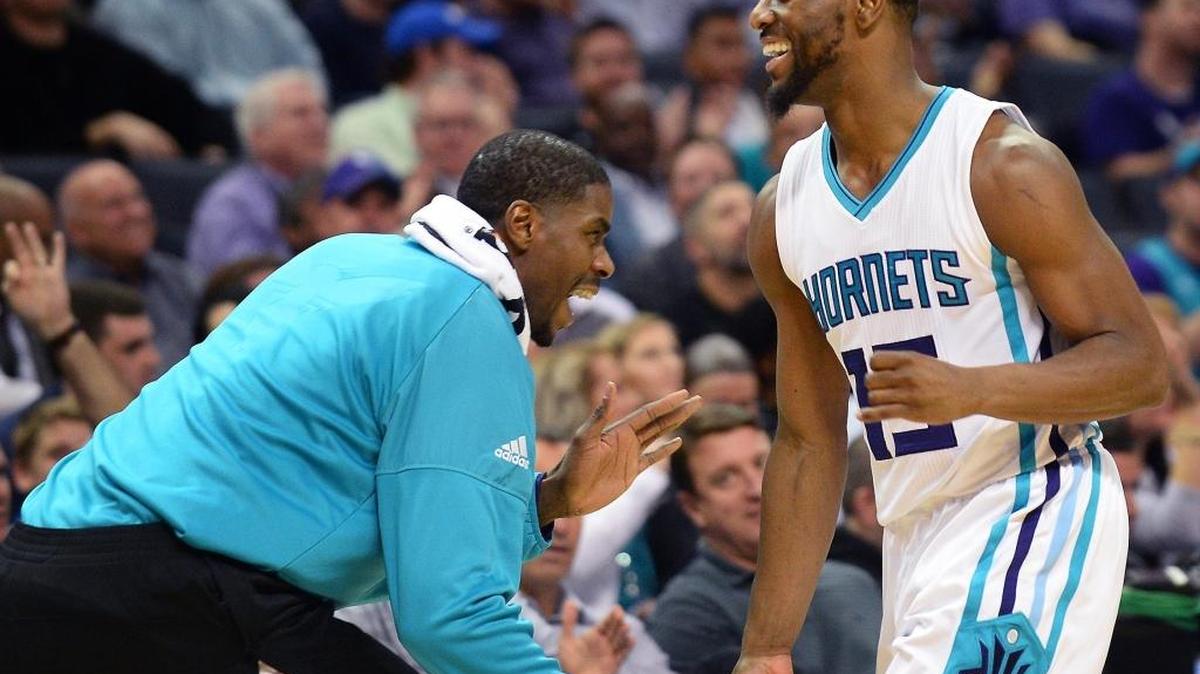 Charlotte Hornets forward Marvin Williams, left, congratulates guard Kemba Walker, right, following a play during second half action against the Portland Trail Blazers at the Spectrum Center in Charlotte, NC on Wednesday, January 18, 2017.