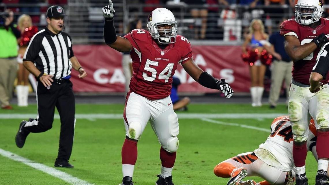 Linebacker Dwight Freeney of the Arizona Cardinals celebrates a third quarter sack during the NFL game against the Cincinnati Bengals on November 22 in Glendale, Ariz. A California judge ruled Thursday that Freeney can proceed with his lawsuit alleging that Bank of America was complicit in a fraud scheme that caused him to lose more than $20 million.