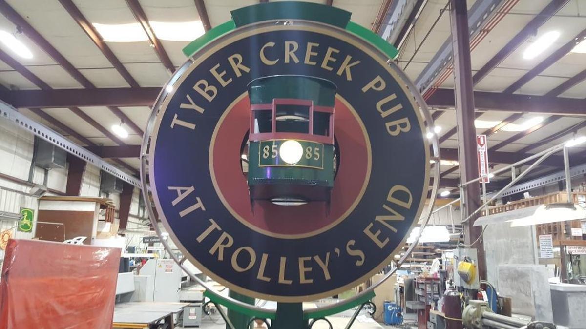 The refurbished Tyber Creek sign
