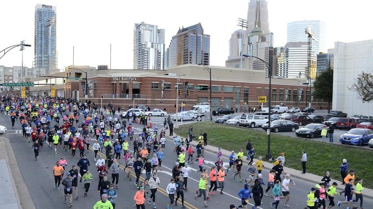Thousands of runners surged from the start of the Thunder Road Marathon at 7:30 a.m. on Nov. 14, 2015.