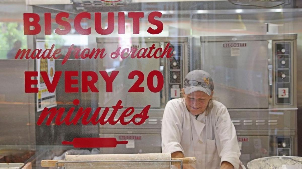 Anita Block works on making a new batch of biscuits at the newly opened and renovated Bojangles in Charlotte’s historic West End in June. Bojangles’ went public in 2015 and started expanding in the Carolinas and into new markets. Since then, things seemed to have sputtered.