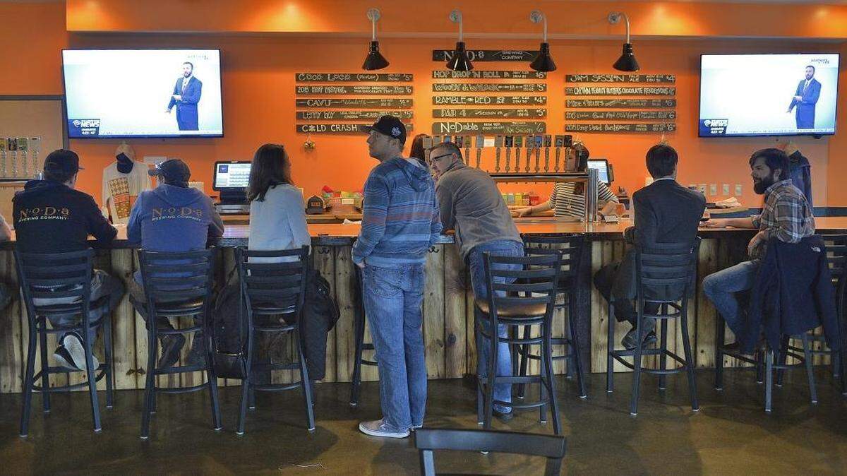 Patrons enjoy tap beer from NoDa Brewing in North End.