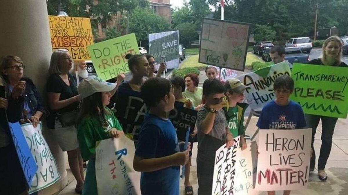 People protesting a Davidson development this summer as part of the Save Davidson group.
