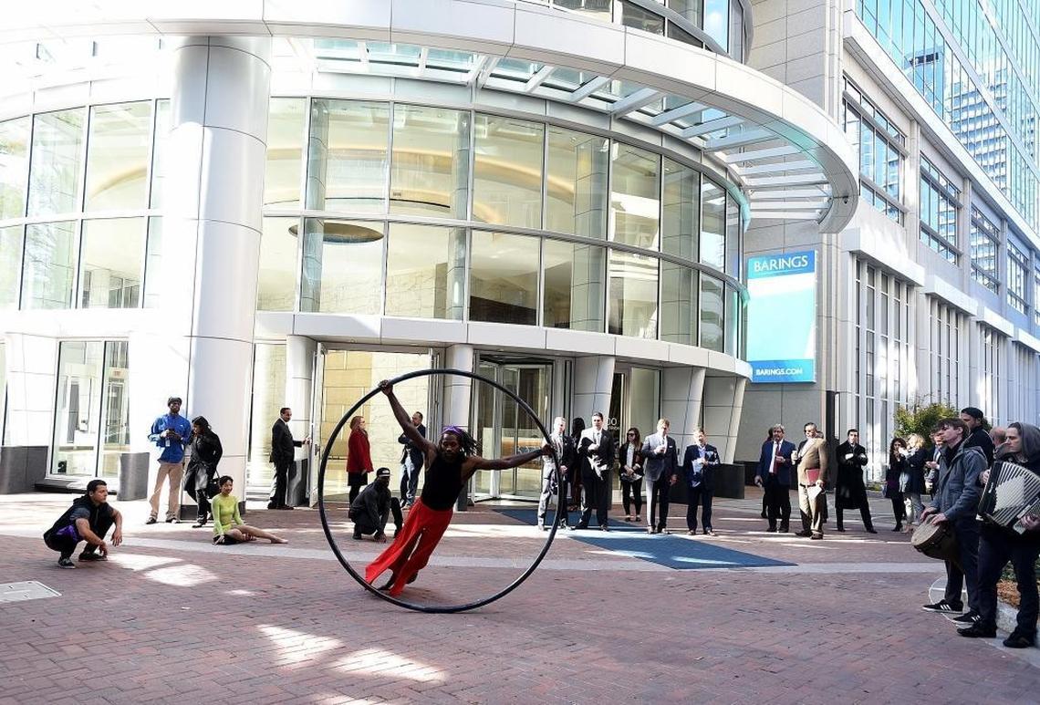 A performer helped celebrate the grand opening of the 300 South Tryon building.
