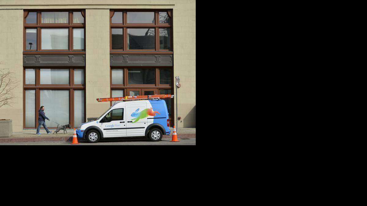 
A Google Fiber service truck parked on a Kansas City street. 
