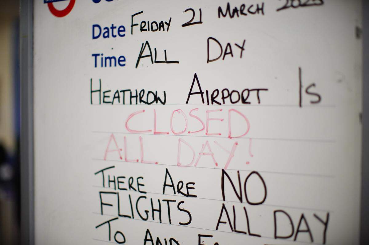 A sign at a tube station at Heathrow Airport in London following the Heathrow Airport fire.