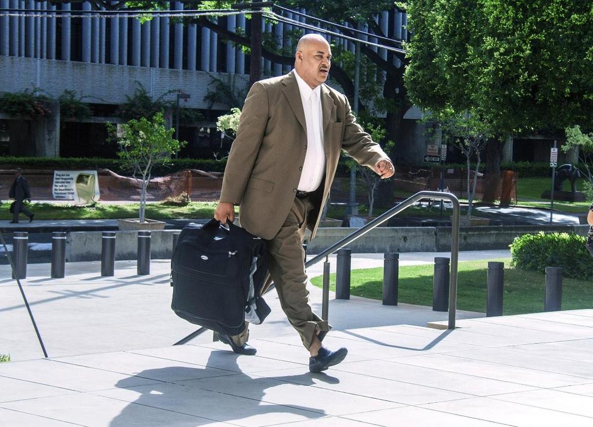 In this Oct. 4, 2016, file photo, North Carolina concert promoter Marc Hubbard walks to federal court in Honolulu.