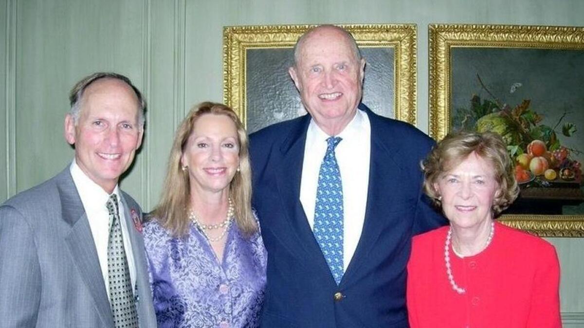 In this file photo, long-time UNC Charlotte benefactor Irwin Belk (second from right) is shown with Chancellor Philip Dubois, his wife, Lisa Lewis Dubois, and Belk’s late wife, Carol.
