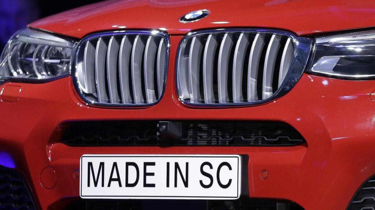 A “Made In SC” plate is shown on a new BMW X4 vehicle as it is unveiled during a news conference at the BMW manufacturing plant in Greer, S.C., on March 28, 2014.