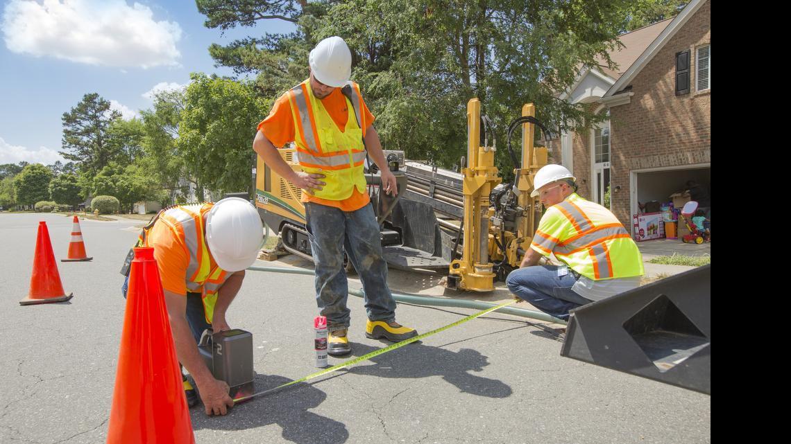 
In this photo provided by Google, Bechtel workers prepare to lay fiberoptic cables for Google’s high-speed Internet service.
