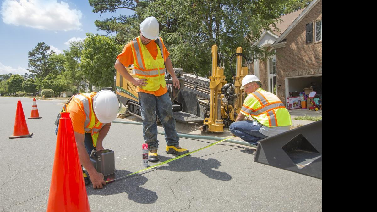 
In this photo provided by Google, Bechtel workers prepare to lay fiberoptic cables for Google’s high-speed Internet service.
