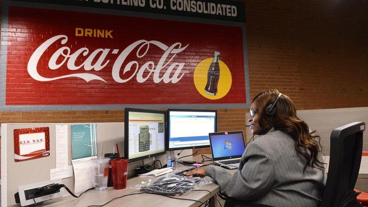 Among the top 50 North Carolina companies, Coca-Cola Bottling’s jump in stock price was the best showing of 2015. Here Natasha Merritt, a customer experience specialist, works at the company’s new Customer Care Center located on West W.T. Harris Boulevard.