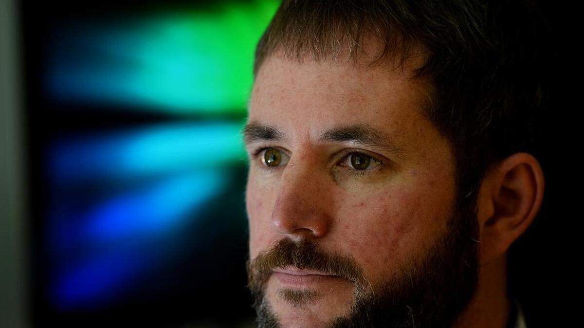 Ethical hacker Denny Deaton at his home office in Huntersville. The firm Deaton works for is growing its Charlotte team, as demand for ethical hackers rises here and elsewhere.