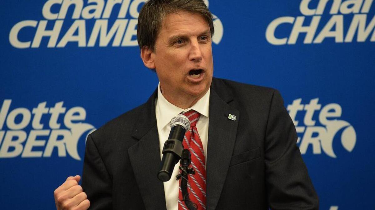 The Charlotte Chamber on Monday issued a statement on North Carolina’s new law limiting LGBT protections that called on city and state leaders “to contribute toward a solution that is in the best interest of our city and state.” Here Gov. Pat McCrory clenches his fist as he makes an economic development announcement last month at the chamber.