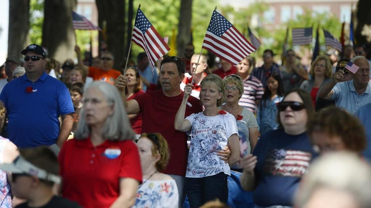 In this 2017 file photo, crowds wave flags during a Memorial Day ceremony in Kannapolis honoring veterans.  Stormy skies in Charlotte should clear out by Saturday to make for a pleasant 2020 Memorial Day weekend, forecasters said.  