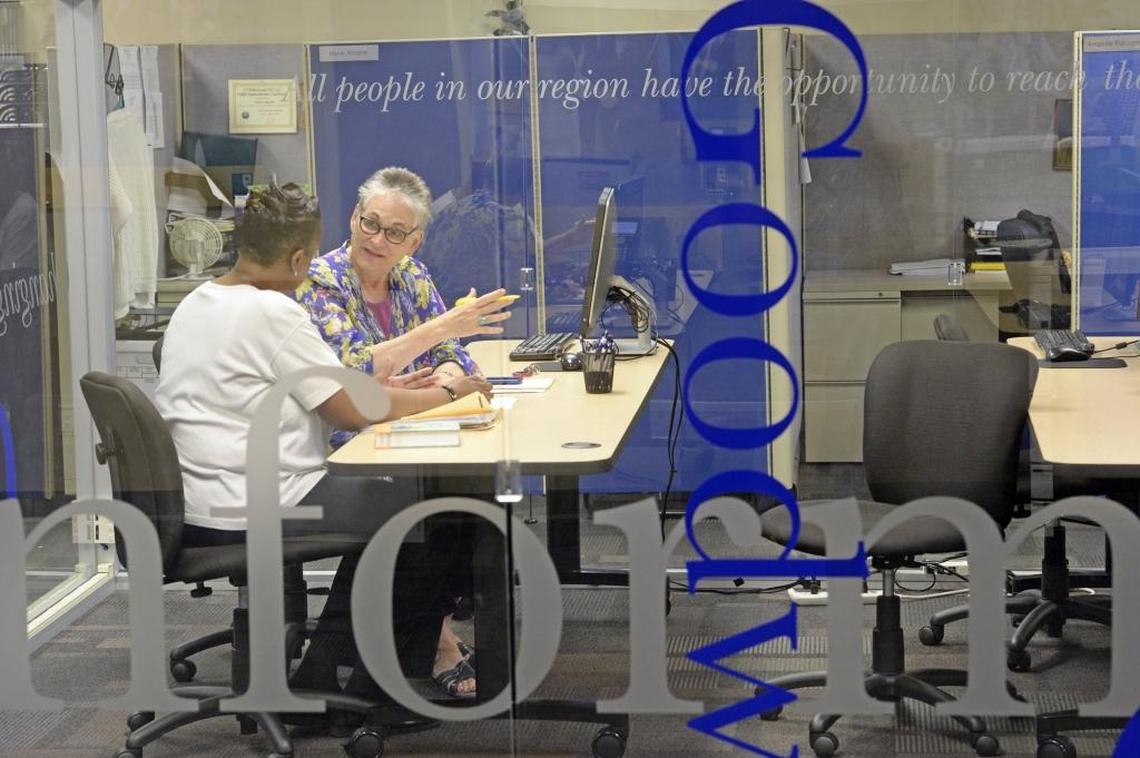 Original: Dinah Ezell (left) is helped by career development specialist Sue Korenstein at Goodwill's career development center on Freedom Drive in a 2013 file photo.