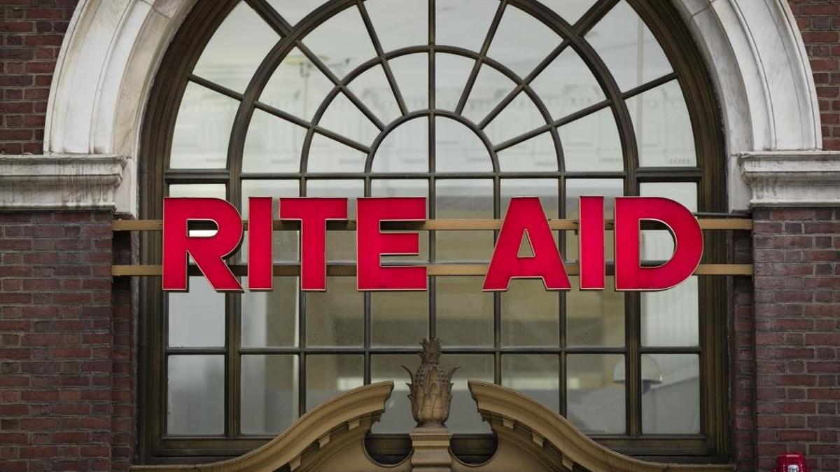This file photo shows a Rite Aid location in Philadelphia. Walgreens and Rite Aid have finally devised a combination of the nation’s largest and third-largest drugstore chains that will get past anti-trust regulators.