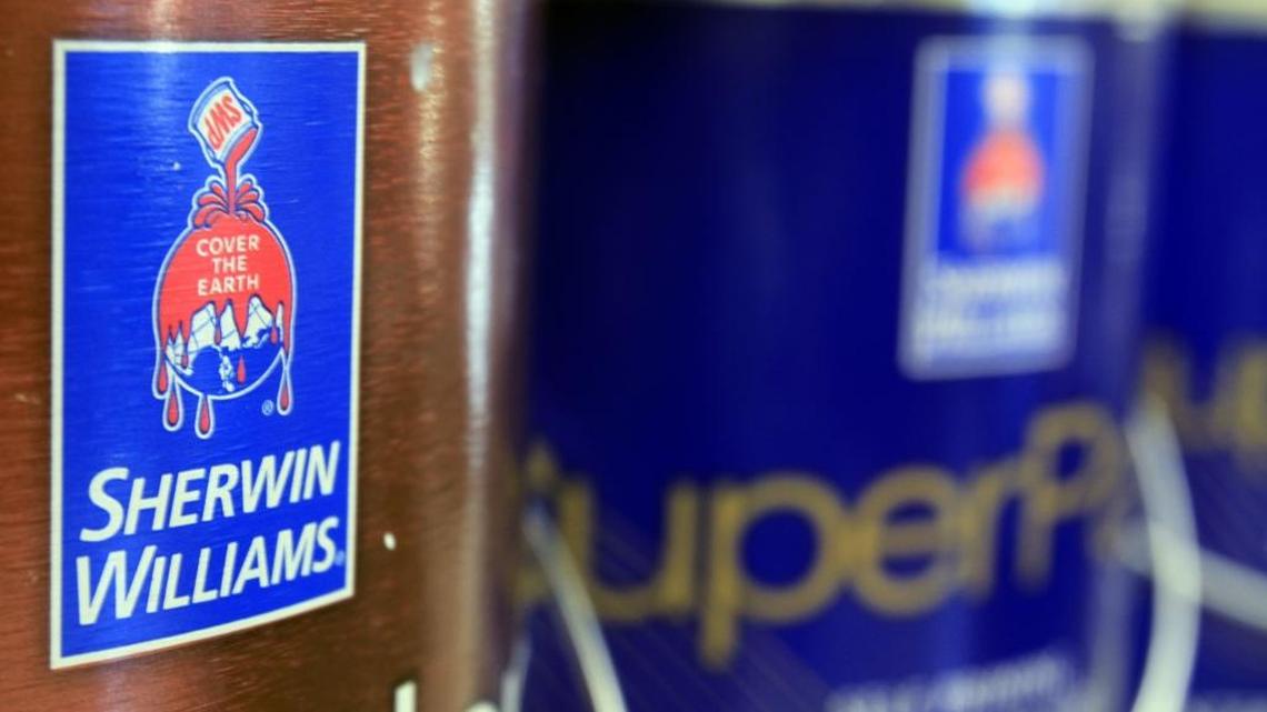 n this Oct. 20, 2010, file photo, cans of paint are seen at a Sherwin Williams store in Brunswick, Maine.