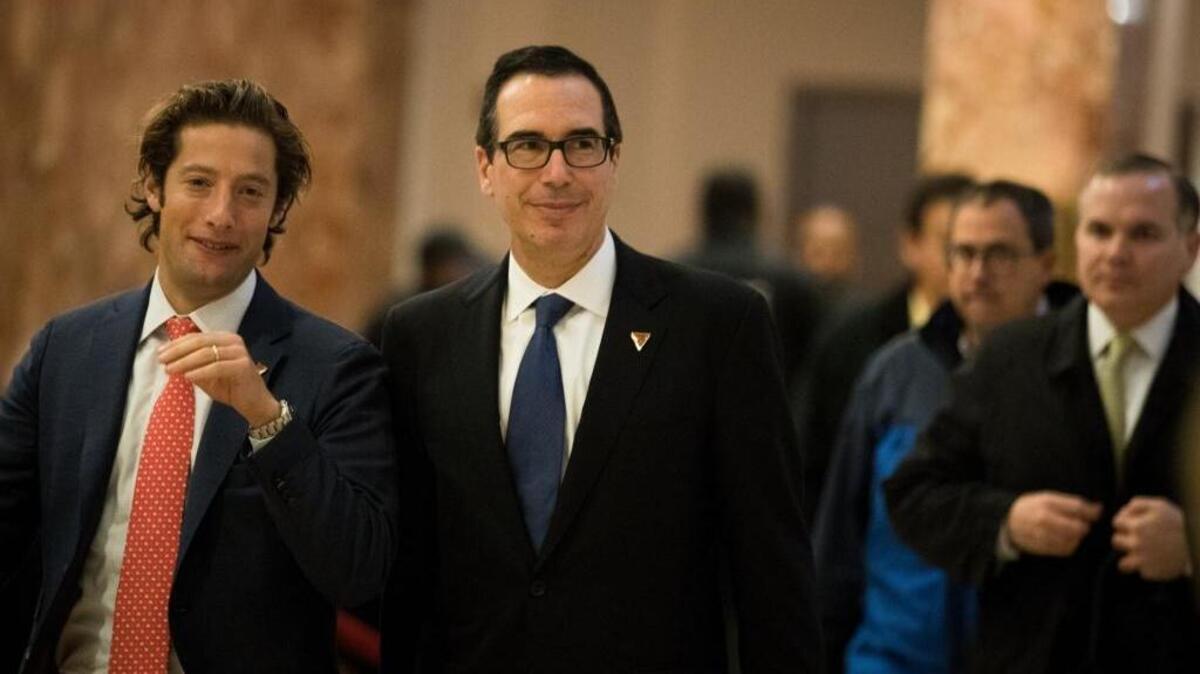 Eli Miller (left), chief operating officer of the Trump campaign, and Steve Mnuchin, national finance chairman for the Trump campaign, arrive at Trump Tower, November 29 in New York City. President-elect Donald Trump and his transition team are in the process of filling cabinet and other high level positions for the new administration. Mnuchin is expected to be selected for Treasury Secretary.