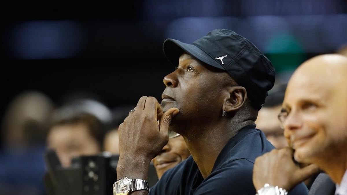 Michael Jordan, center, is one of three NBA owners investing millions of dollars into Sportradar AG, a Switzerland-based sports data company.