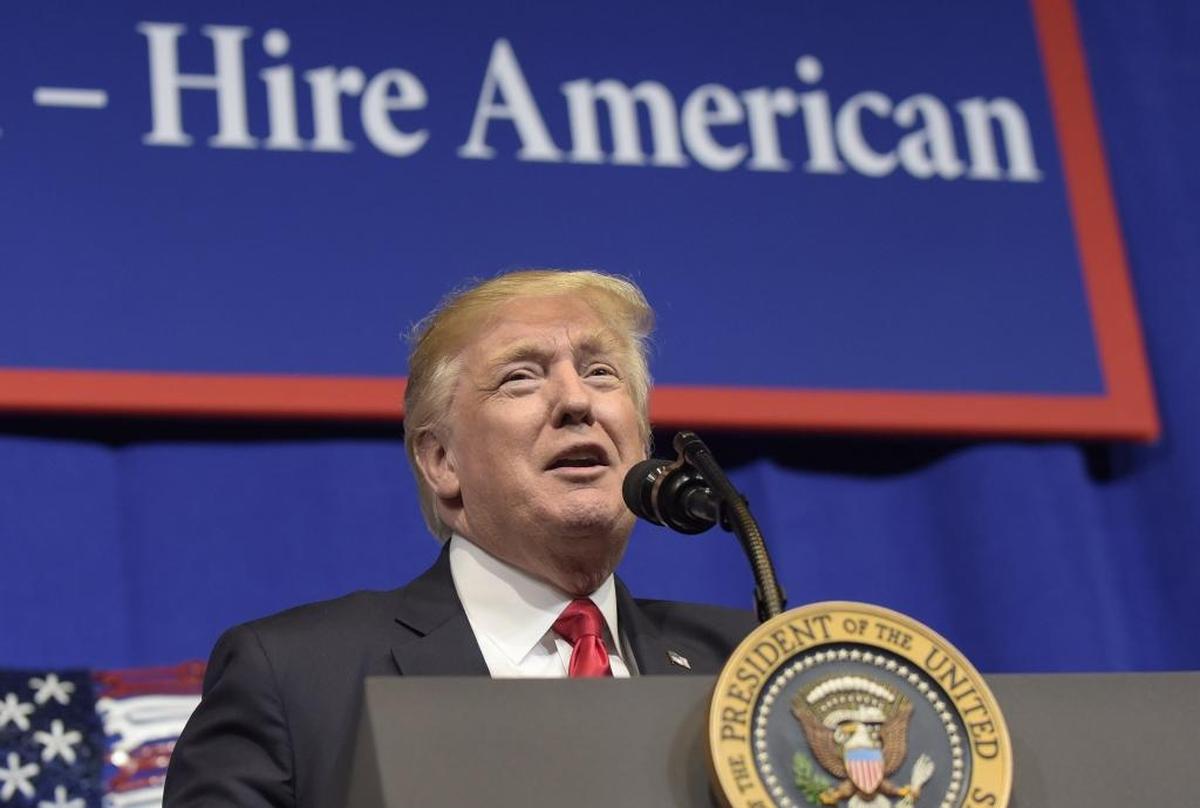 President Donald Trump speaks at tool manufacturer Snap-on Inc. in Kenosha, Wis., in April. He later signed an executive order that seeks to make changes to a visa program that brings in high-skilled workers.