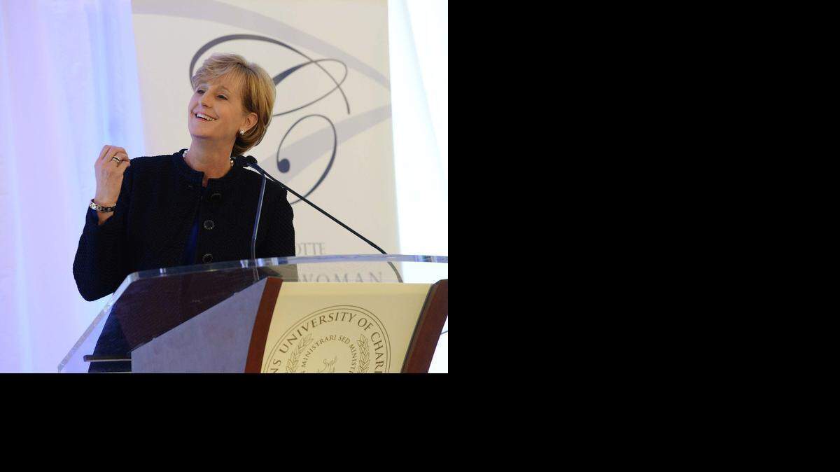 
Susan DeVore,President and CEO, Premier,Inc was named 2014 CharlotteBusiness Woman of the Year. Here she speaks to the audience during a luncheon and awards ceremony held at Queens University of Charlotte.
