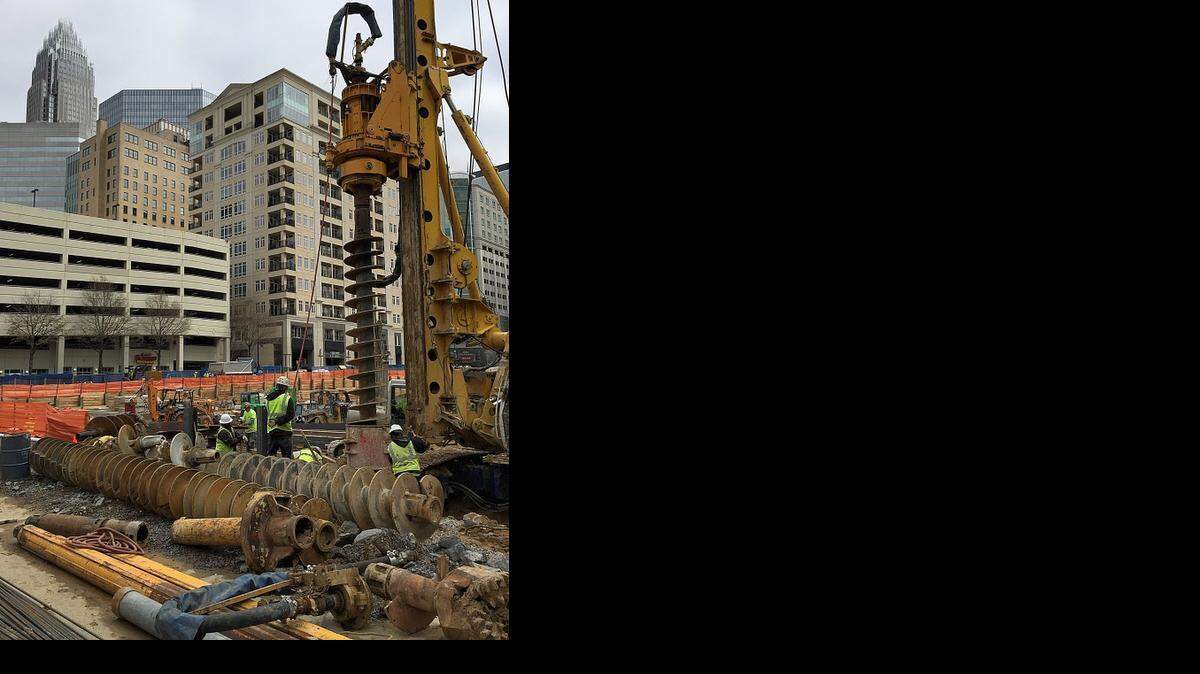 
Workers continue drilling and excavating Friday for a new office tower at 300 S. Tryon St., part of a surge of construction that’s adding to uptown’s skyline. 
