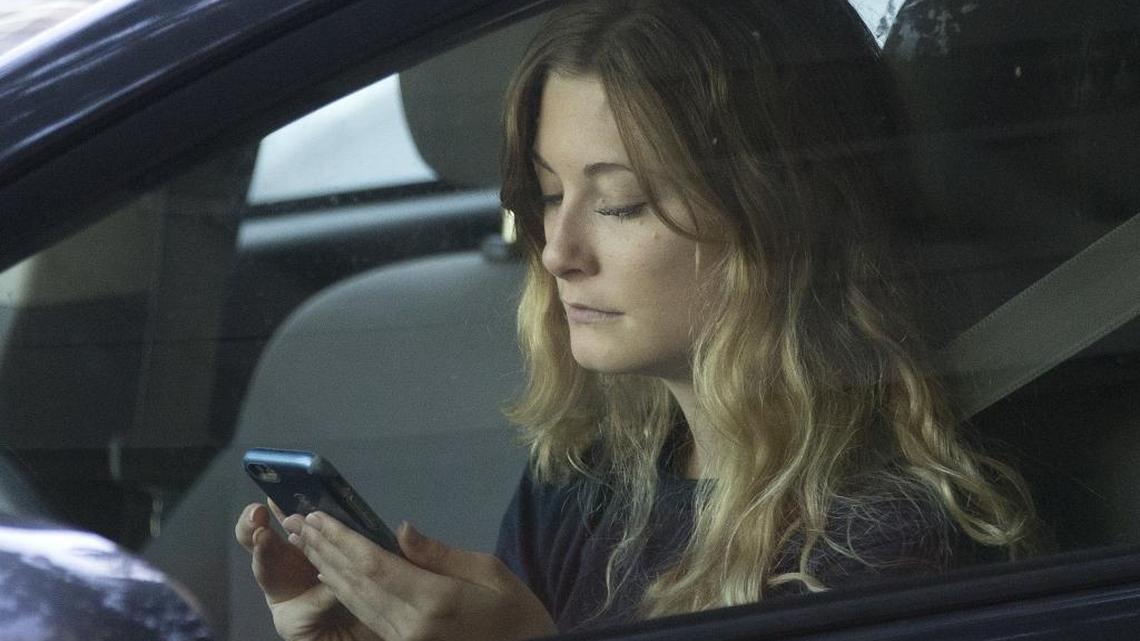 Smartphone-addicted drivers are facing more scrutiny from North Carolina insurers who say distracted driving is causing more wrecks. More than one in three text while driving, and 29 percent access the internet while driving, according to a survey by State Farm Insurance.