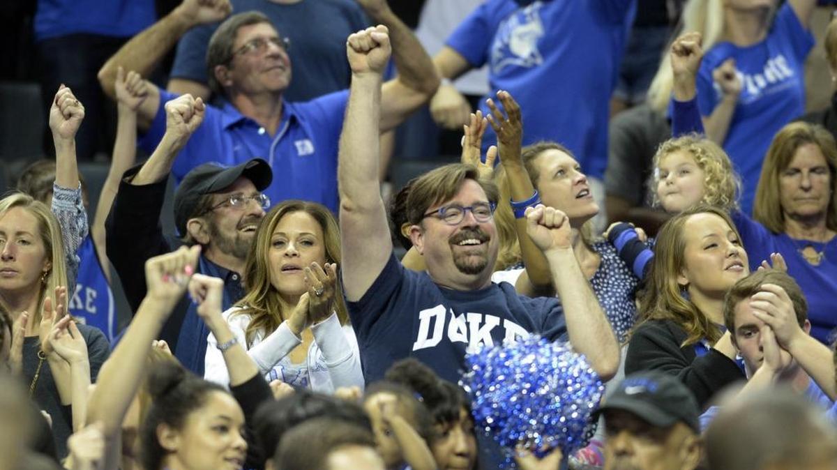 Duke fans cheer on their team against the San Diego State Aztecs in the second half of the third round of the NCAA men’s basketball tournament at Time Warner Cable Arena in March.