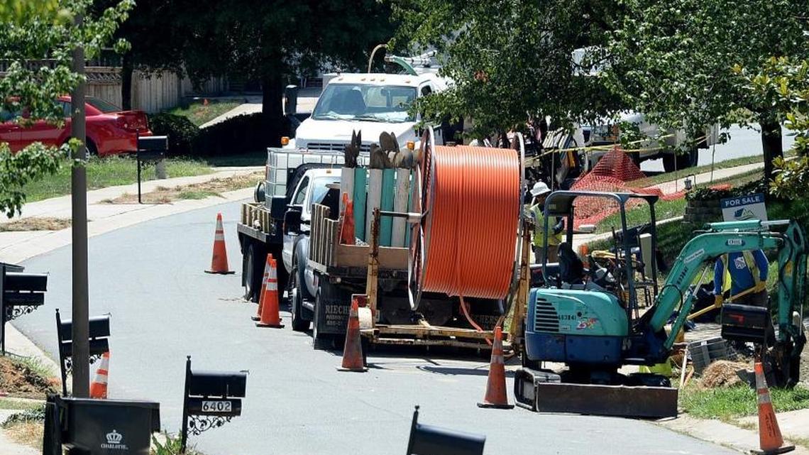 Contractors install fiber-optic cable lines in Charlotte in 2015.
