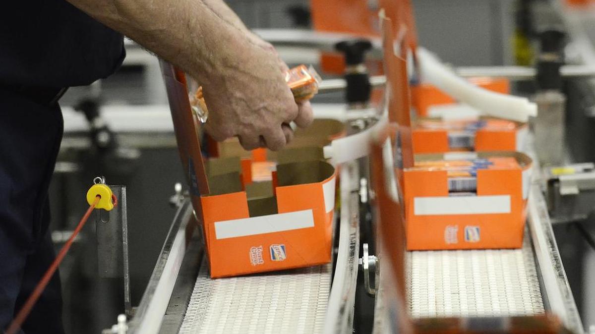 
Some cartons of Toast Chee need hands on help to straighten or add packages to complete the carton. 
