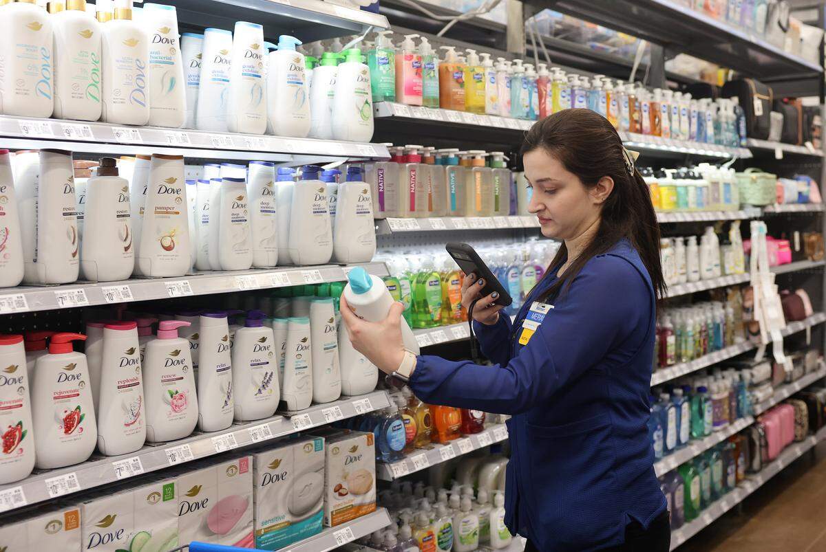 Meral Kemaloglu shops for online orders Thursday at the Indian Trail Walmart.