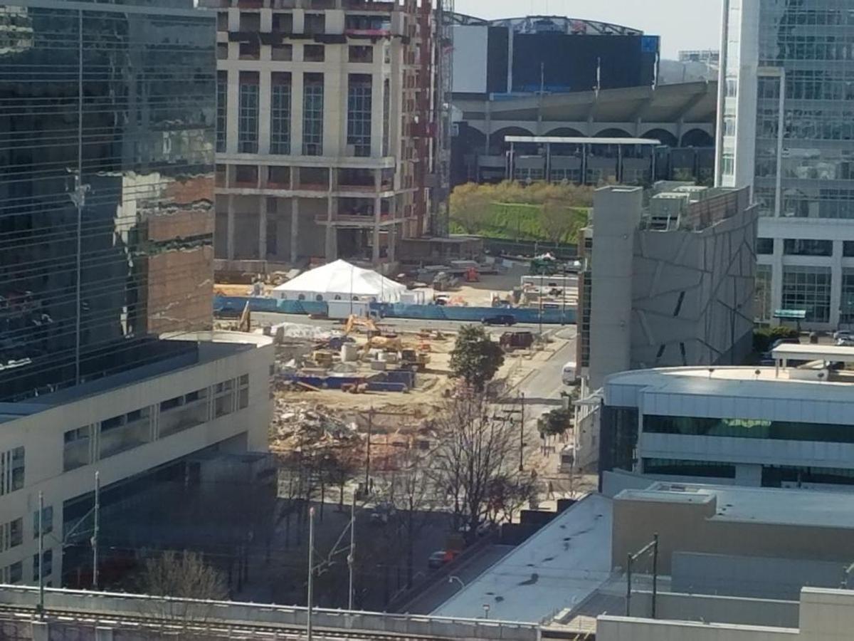 This 2018 photo shows the former site of 600 S. College Street, middle of the frame. It was home to the Query-Spivey-McGee building. The three-story structure was built in 1902 and served as stables,  architectural supply stores, an auto repair shop and a gardening supply company. It was torn down in March 2018.