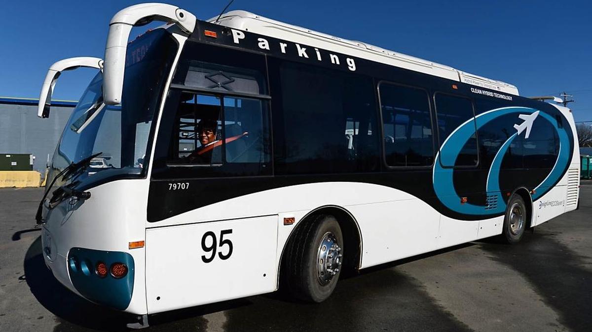 
Lillie Mae Duncan drives her bus to the maintenance lot outside Charlotte Douglas International Airport Wednesday, December 18, 2013. The Charlotte airport's 10 buses made by bankrupt bus manufacturer DesignLine have suffered a fire, brake problems, ongoing maintenance issues and a scarcity of parts over the last seven years.
