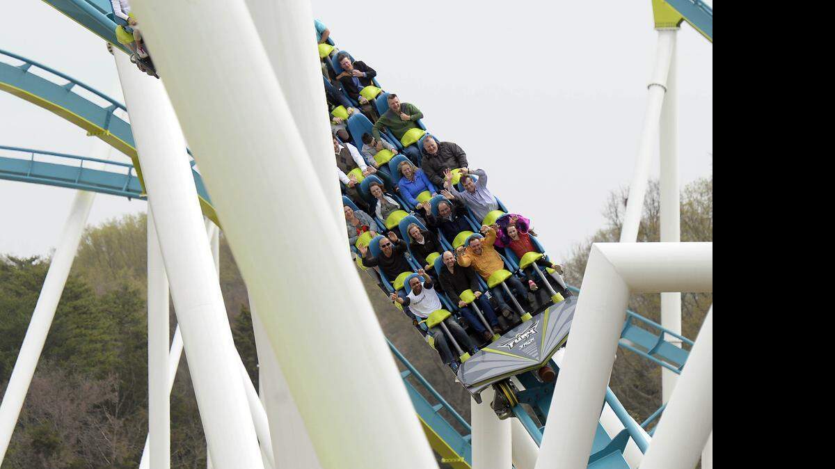 
Passengers enjoy Carowinds' new Fury 325, billed as the world’s tallest and fastest giga coaster, last month. Fury 325 stopped unexpectedly on its tracks Saturday, stranding 32 riders. 
