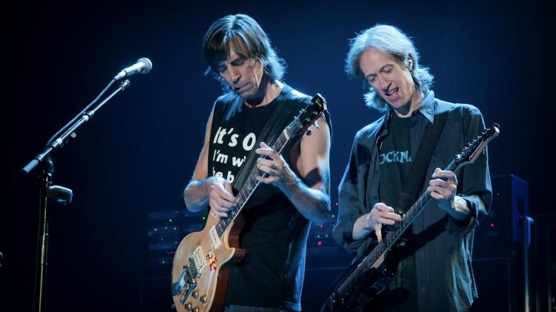 Boston’s founder Tom Scholz, left, and Gary Pihl play the distinctive Boston sound on ‘Hitch a Ride” in a Miami Herald file photo.
