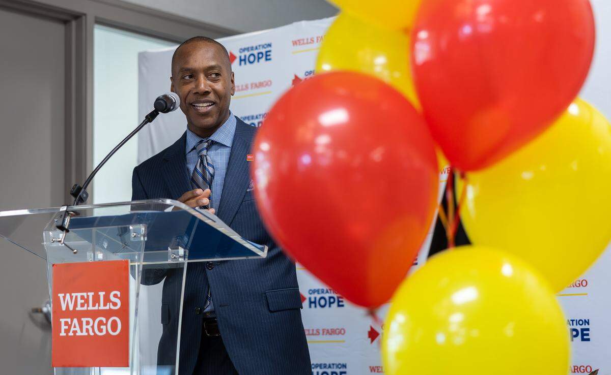 Michael Martino, head of Banking Inclusion Initiative at Wells Fargo, speaks, during a press conference for Wells Fargo and Operation HOPE at the redesigned Freedom Drive bank branch in Charlotte, N.C., on Thursday, September 25, 2025.
