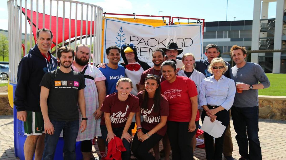
Indian Land, S.C.-based technology company, Red Ventures, held an ALS fundraiser benefitting the Packard Center for ALS Research at Johns Hopkins that raised $9,000 and sent 15 senior leaders to the dunk tank. Packard Center board member and Charlotte resident Crandall Bowles was also in attendance. Pictured from left to right, back row: CEO Ric Elias, Francisco Debs, Taylor Goddard, David Torrence, Ian Howells, Kevin Jeffries, Dale Lancaster, Katie Zach, John Comly, Crandall Bowles, John Sutton. Front row: Hallie Kilmer, Jen Koniuk, Adayna Gonzalez.
