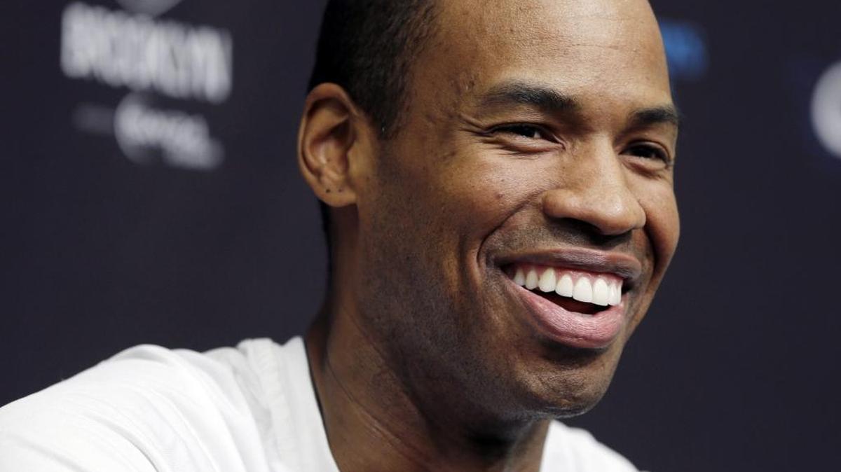 In this March 3, 2014, file photo, Brooklyn Nets Jason Collins speaks during a news conference before an NBA basketball game against the Chicago Bulls at the Barclays Center in New York. Collins, the NBA's first openly gay player, announced his retirement on Nov. 19, 2014.