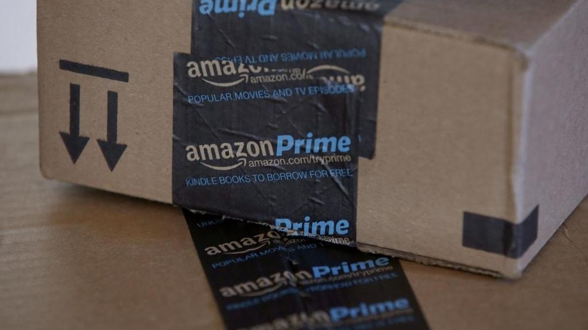 This June 4, 2014 photo shows Amazon.com boxes in Phoenix.