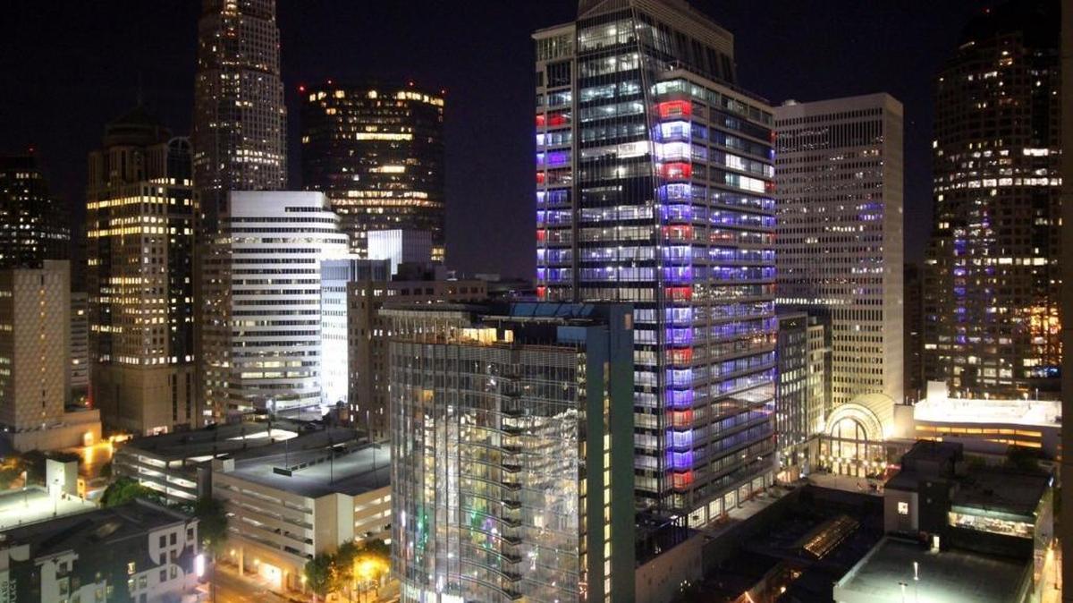 300 South Tryon at night, lit up, center.