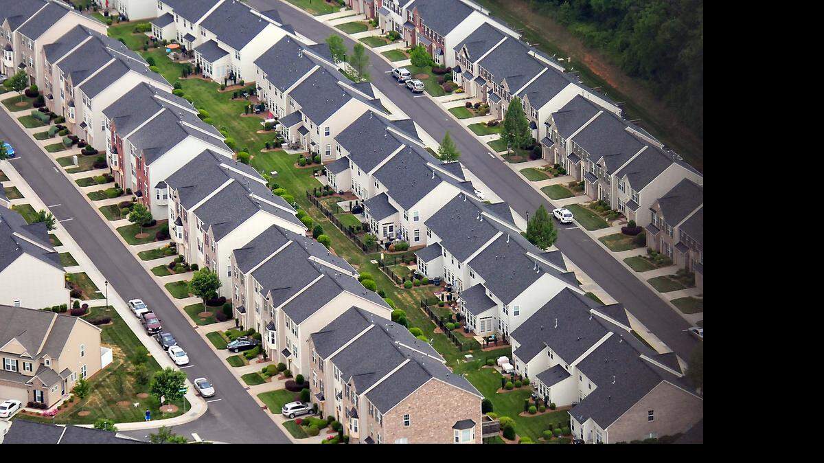 
Rows of houses line Park South Station in south Charlotte last week. In January Charlotte home prices were up 3 percent from 2014. By April the year-over-year increase had surged to 8.6 percent, Charlotte Regional Realtor Association figures show.

