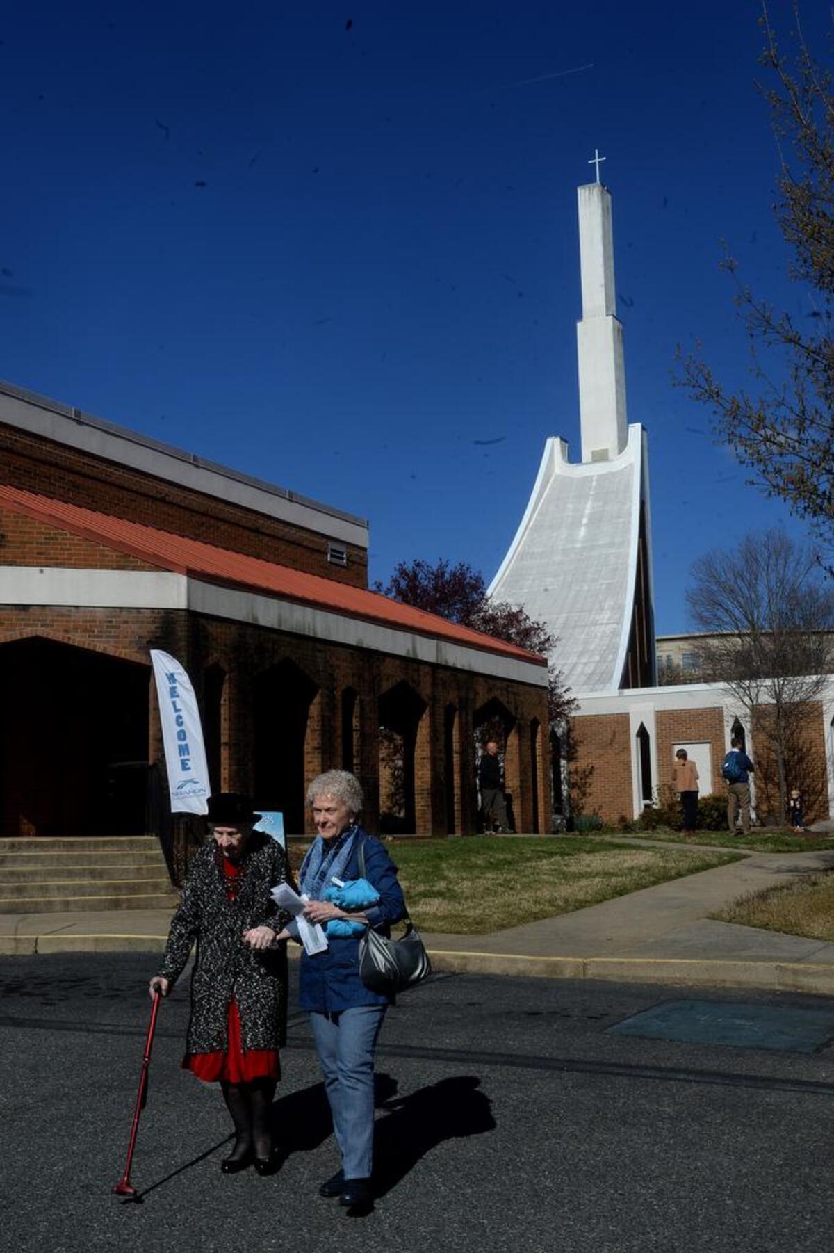 Hilda and Sharon Dailey leave the old church building for the last time after final services in 2017. They have been members since 2001.