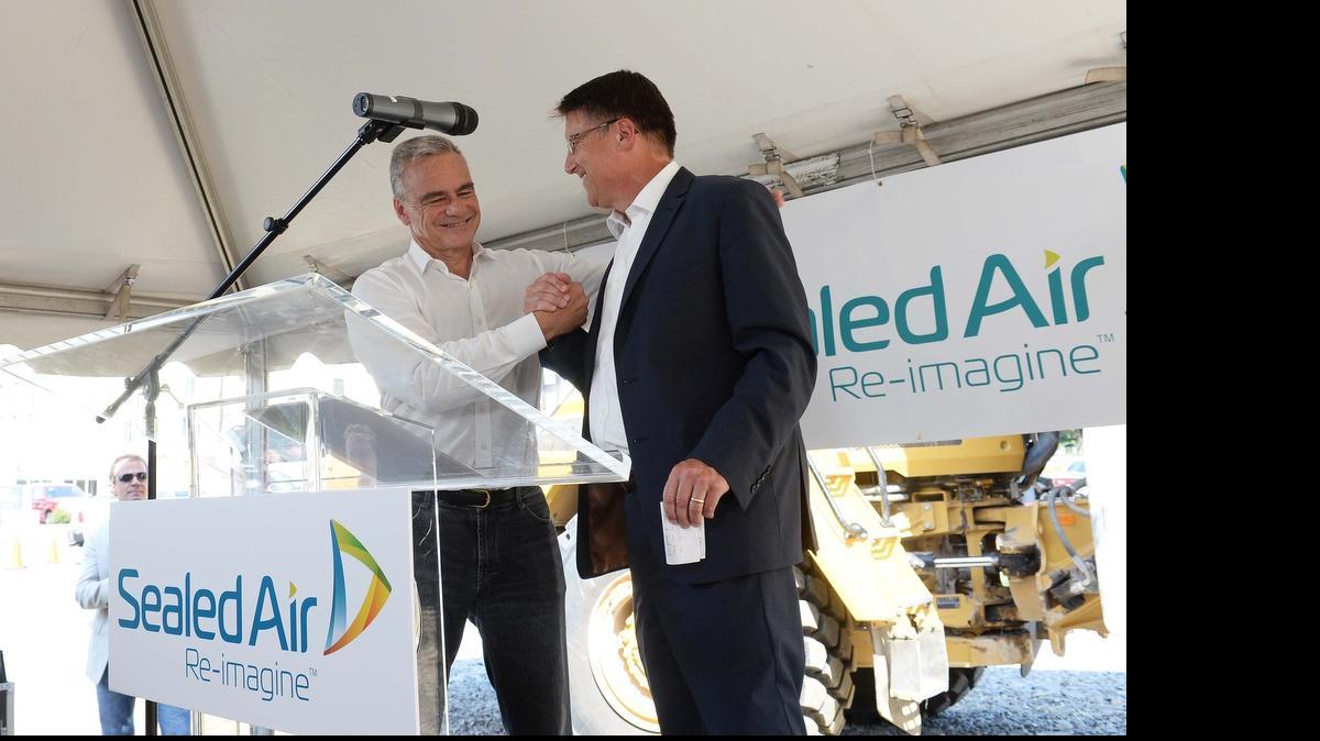 
Jerome Peribere, president and CEO of Sealed Air, left, and Governor Pat McCrory at the groundbreaking ceremonies for the Sealed Air global corporate headquarters in June. 
