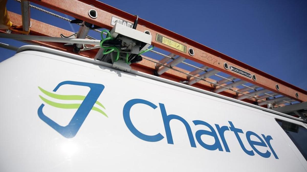 This 2015 file photo, shows a Charter Communications van in St. Louis.