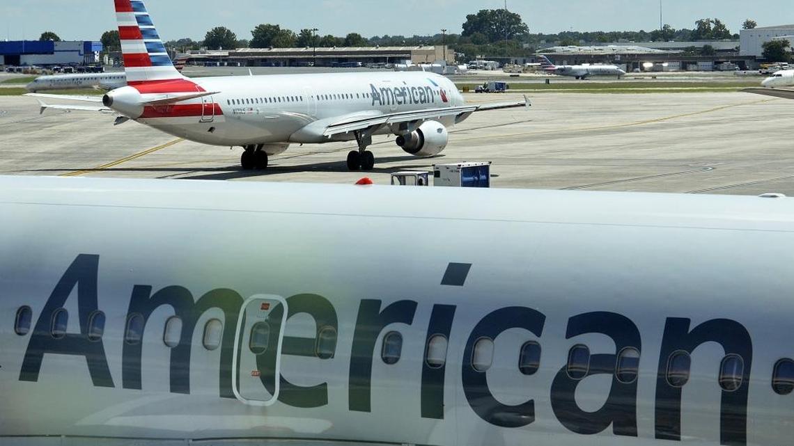 American Airlines planes taxi in Charlotte.