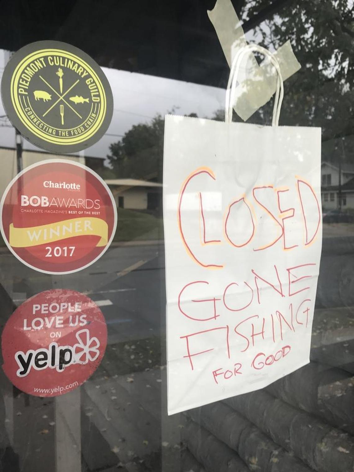 Sign in the window of Catch On.