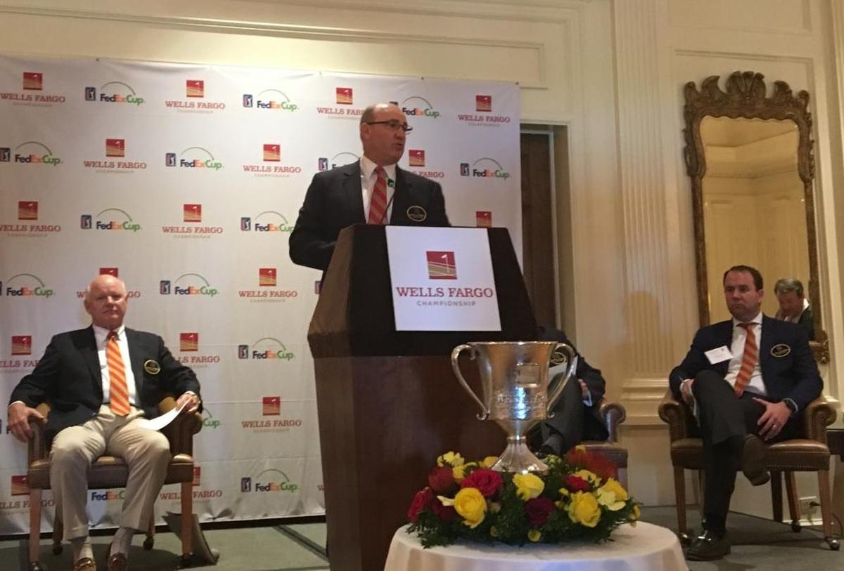 Kendall Alley, Charlotte regional president for tournament sponsor Wells Fargo, speaks at a news conference highlighting coming changes at the Wells Fargo Championship. Tournament executive director Hollis Cavner is on his left; Champions for Education co-chairman Johno Harris is on his right.