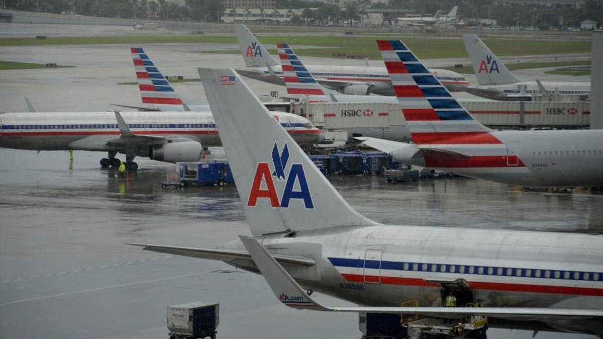 
An American Airlines jets sit parked at a terminal of Miami International Airport in Miami in this Sept. 23, 2014 file photo. 
